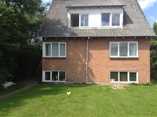 Lækker lejlighed med højt til loftet