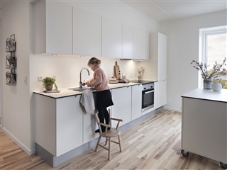 Lys og funktionel 3 værelses på første sal