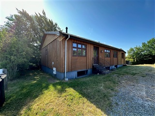 Fritliggende hus på stor grund – mange mulighed...