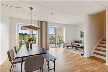 Velindrettet rækkehus i grønne omgivelser ved...