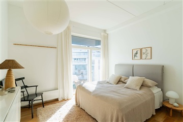 Lys og moderne lejlighed i ikoniske 8-tallet